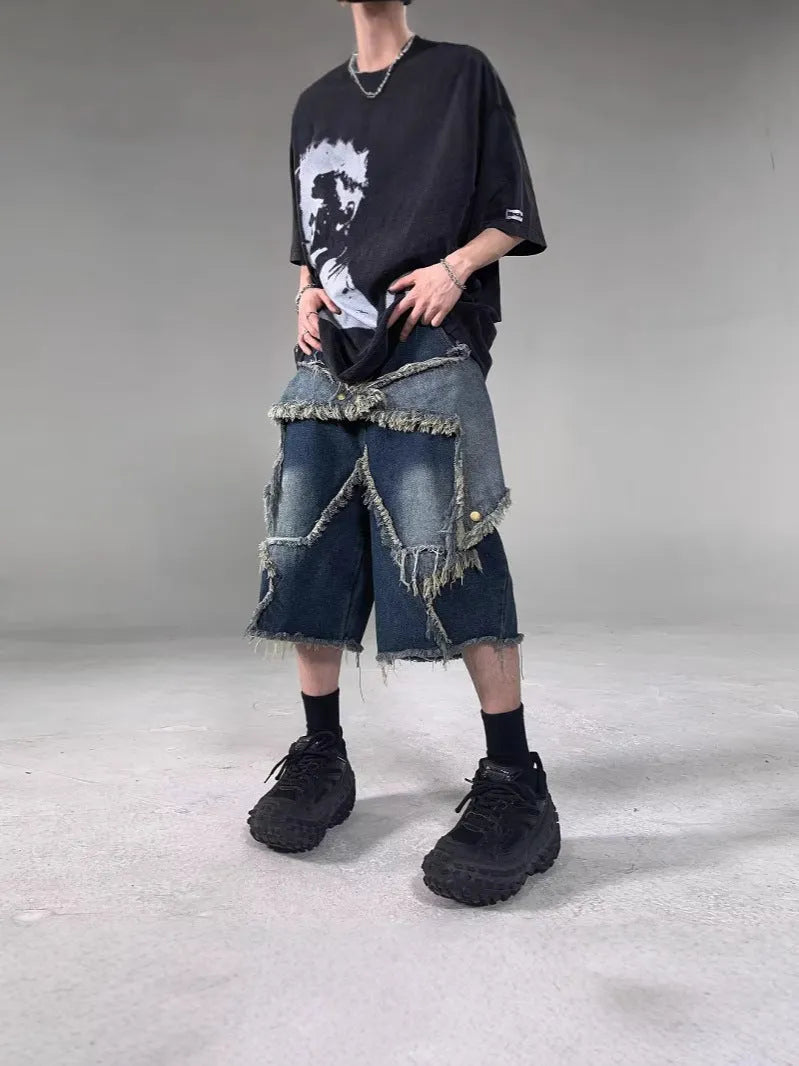 Blue denim shorts with frayed five-pointed star design and loose fit for summer casual wear